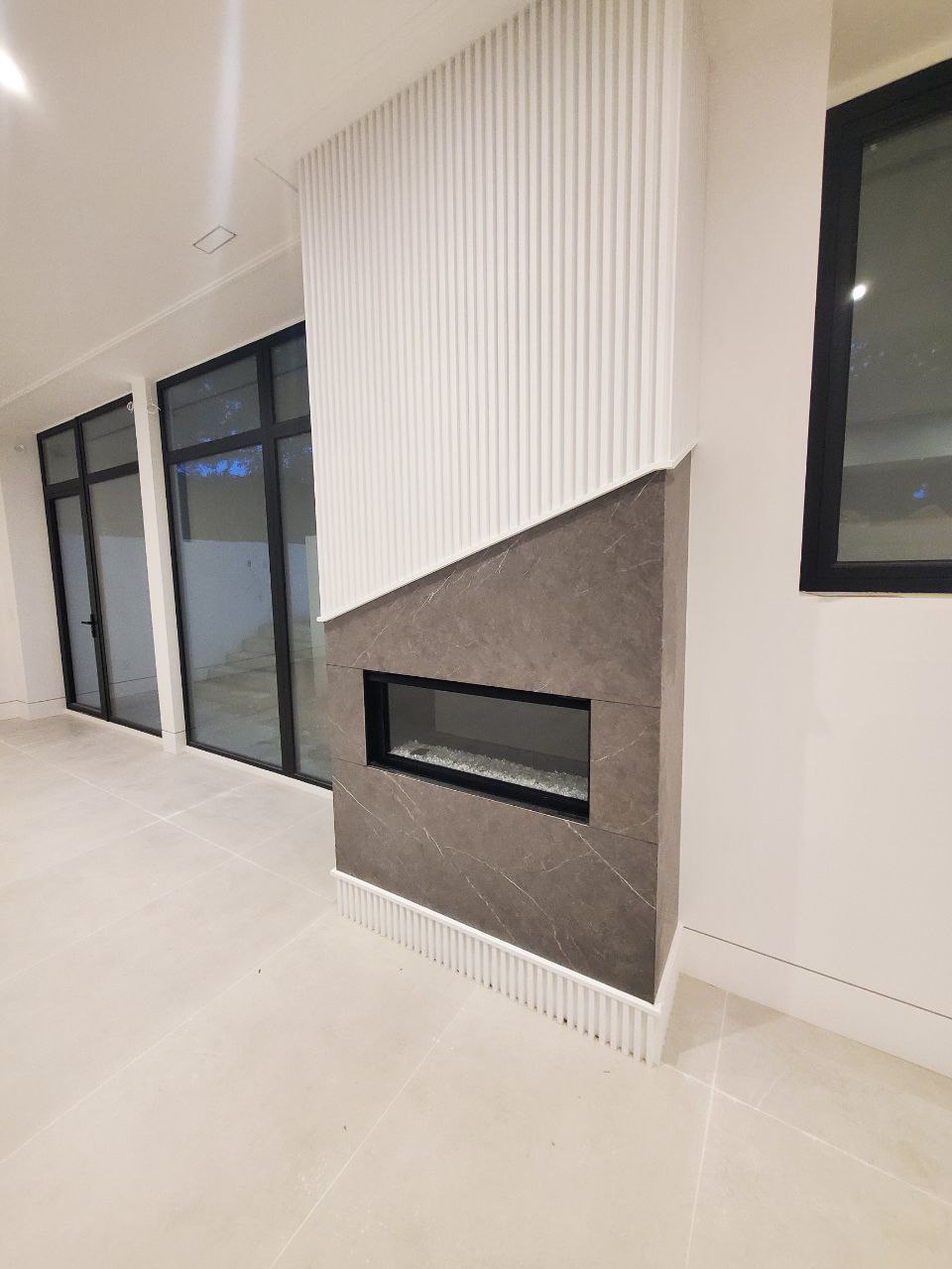 Luxurious master ensuite bathroom with freestanding tub and glass shower