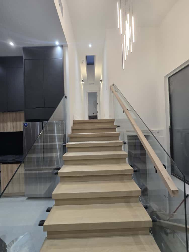 3-inch white oak staircase with modern glass railings