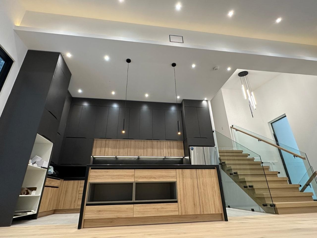 Custom kitchen cabinetry with sleek finishes and built-in appliances